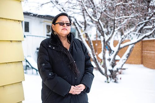 MIKAELA MACKENZIE / WINNIPEG FREE PRESS

Alison Cox, who was triaged with her husband in a cold hospital garage last night with pneumonia, poses for a portrait outside of her home in Winnipeg on Wednesday, Dec. 14, 2022. For Malak story.
Winnipeg Free Press 2022.