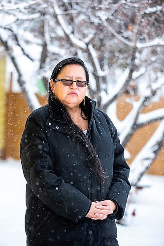 MIKAELA MACKENZIE / WINNIPEG FREE PRESS

Alison Cox, who was triaged with her husband in a cold hospital garage last night with pneumonia, poses for a portrait outside of her home in Winnipeg on Wednesday, Dec. 14, 2022. For Malak story.
Winnipeg Free Press 2022.