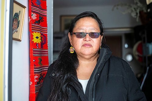 MIKAELA MACKENZIE / WINNIPEG FREE PRESS

Alison Cox, who was triaged with her husband in a cold hospital garage last night with pneumonia, poses for a portrait outside of her home in Winnipeg on Wednesday, Dec. 14, 2022. For Malak story.
Winnipeg Free Press 2022.