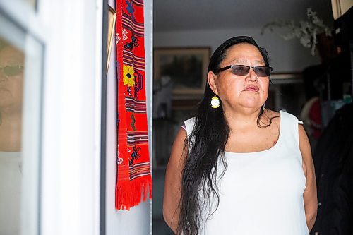 MIKAELA MACKENZIE / WINNIPEG FREE PRESS

Alison Cox, who was triaged with her husband in a cold hospital garage last night with pneumonia, poses for a portrait outside of her home in Winnipeg on Wednesday, Dec. 14, 2022. For Malak story.
Winnipeg Free Press 2022.