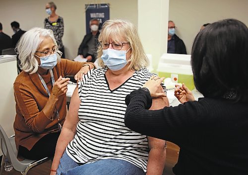 Brandonite, and vaccine recipient Sue is happy to have a COVID-19 and flu shot at the same time. The Flu Clinic is run by Prairie Mountain Health in the Brandon Shoppers Mall. Walk-ins are accepted, appointments are encouraged. (Michele McDougall/The Brandon Sun)