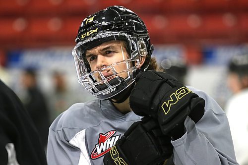 Wheat Kings forward Jake Chiasson wears a full cage on Thursday after sustaining a cut on his lip at practice on Wednesday. (Perry Bergson/The Brandon Sun)