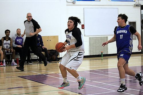 Brannigan Ferland of the Vincent Massey Vikings prepares to make a shot during his team's 87-73 win over the River East Kodiaks during a Pool B game at the Brandon Sun Spartan Invitational on Thursday evening. (Lucas Punkari/The Brandon Sun)