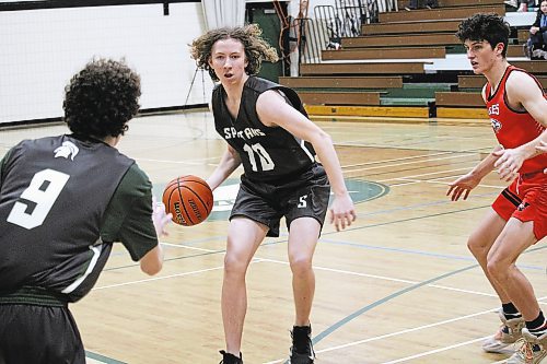 Jeremy Slominay (#9) waits for a pass from Neelin Spartans teammate Ethan Olson during their opening game of the Brandon Sun Spartan Invitational against the Weyburn Eagles on Thursday afternoon. (Lucas Punkari/The Brandon Sun)