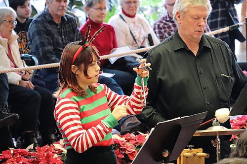 Members of the Brandon Community Orchestra perform a variety of holiday-themed music at City Hall Sunday afternoon. (Kyle Darbyson/The Brandon Sun) 