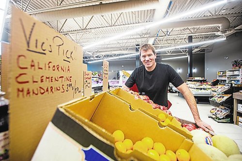 MIKAELA MACKENZIE / WINNIPEG FREE PRESS

Scott Schriemer, owner of Vic&#x2019;s Market, poses for a photo in the new store location in Winnipeg on Tuesday, Dec. 13, 2022. For Dave Sanderson story.
Winnipeg Free Press 2022.