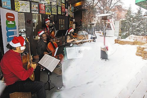 Daniel Crump / Winnipeg Free Press. The Manitoba Chamber Orchestra performs Christmas songs inside the the Gas Station Arts Centre as part of the programming for Winter in the Village. The event is put on by Osborne Village BIZ and the Gas Station Arts Centre in partnership with The Beer Can, started Friday and continues Saturday and Sunday. December 17, 2022.