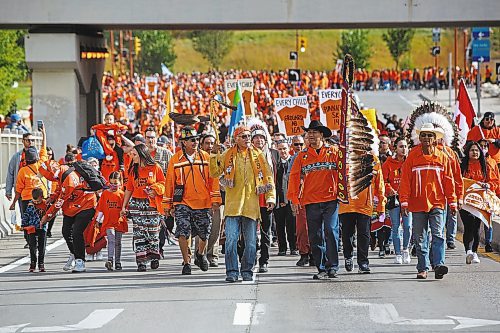 MIKE DEAL / WINNIPEG FREE PRESS

Hundreds of people take part in the march towards the RBC Convention Centre from The Forks Friday morning on the National Day of Truth and Reconciliation. 

220930 - Friday, September 30, 2022.