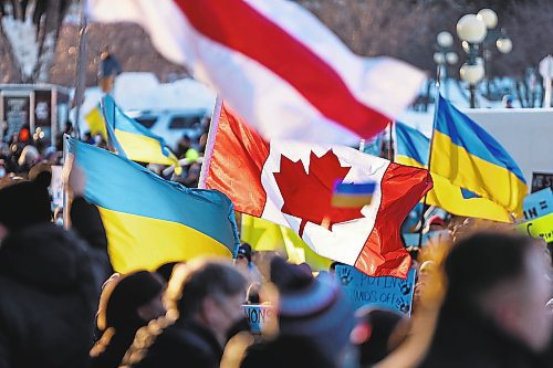 Daniel Crump / Winnipeg Free Press. Thousands gathered at the Manitoba legislature in Winnipeg Saturday evening to show their support for Ukraine. February 26, 2022.