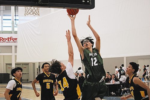 Max Winters of the Neelin Spartans leaps up to make a shot during his team's Brandon Sun Spartans Invititational Tier 1 semifinal game with the Dakota Lancers on Satursday afternoon at the Healthy Living Centre. (Lucas Punkari/The Brandon Sun)