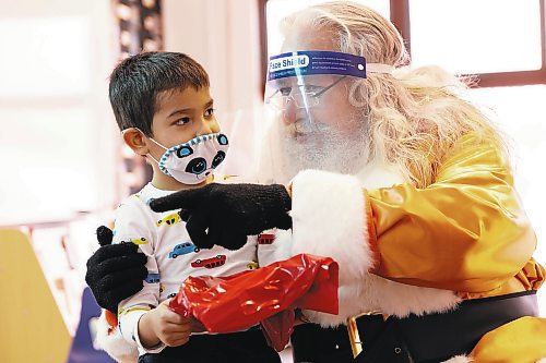 Brandon Sun SCO Orange Santa visits Keeseekoowenin Elementary School Friday. (Chelsea Kemp/The Brandon Sun)