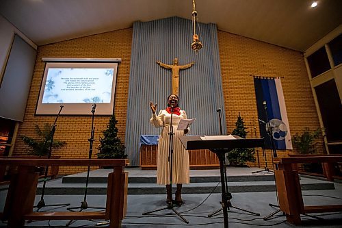 Daniel Crump / Winnipeg Free Press. Pelumi Ruth Enejoh sings Christmas songs during Carols of Christmas: The Greatest Story Ever Told at the Apostolic Faith Church in Winnipeg. December 18, 2022.