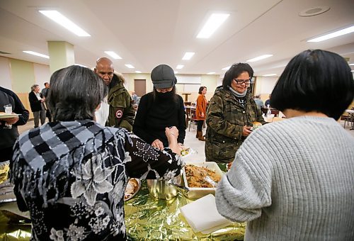 JOHN WOODS / WINNIPEG FREE PRESS
Parishioners take part in a community meal after a service at Knox United Church in Winnipeg Sunday, December 18, 2022. Knox United Church is an intercultural church and community hub in the heart of the Central Park neighbourhood of Winnipeg.

Re: Marten