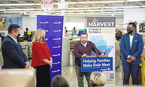 JESSICA LEE / WINNIPEG FREE PRESS

From left: MLA James Teitsma, MLA Rochelle Squires, president and CEO of Harvest Manitoba Vince Barletta and MLA Obby Khan are photographed at a press conference announcing more funding for Harvest Manitoba on December 19, 2022.

Reporter: Danielle Da Silva