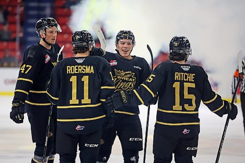 Brandon Wheat Kings Mason Ward (47), Rylen Roersma (7), Matt Henry (67) and Nolan Ritchie (15) celebrate Roersma&#x2019;s goal against the Prince Albert Raiders at Westoba Place on Dec. 2. The team hasn&#x2019;t had a lot to celebrate on some nights in the first half. (Photos by Tim Smith/The Brandon Sun)