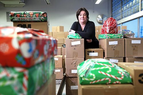 RUTH BONNEVILLE / WINNIPEG FREE PRESS 

Local -Christmas Cheer Board

Shauna Bell, Cheer Boards executive director, stands in  rows of hampers staked at their warehouse that still need to be delivered before end of the week.  

See Marshal's Story.

Dec 19th,  2022