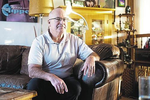 MIKAELA MACKENZIE / WINNIPEG FREE PRESS

David Gaboury, who has had major prostate cancer surgery cancelled at the last minute (and later rescheduled), poses for a photo in his home in Winnipeg on Tuesday, Dec. 20, 2022.  For Katie May story.
Winnipeg Free Press 2022.