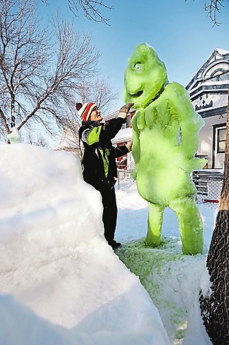 RUTH BONNEVILLE / WINNIPEG FREE PRESS 

LOCAL - Grinch

Photos of  Leigh Keast and the Grinch and reindeer snow sculptures he created in his front yard on Aberdeen Ave.

GRINCH SNOW SCULPTURE: Leigh Keast has built an 8 ft. Grinch sculpture out of snow and ice in his front yard. Keast has created snow sculptures at his Aberdeen Ave. home every winter for the past 6 or 7 years. Over the past three weeks, he sculpted a giant Grinch sculpture that he coloured green with food colouring. The Grinch stands next to Keastճ re-creation of a team of reindeer pulling Santaճ sleigh.


Story by Marshal Hodgins


Dec 20th,  2022