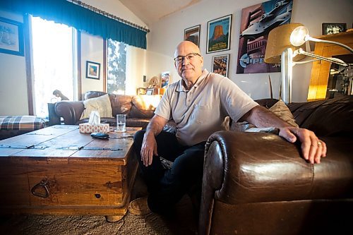 MIKAELA MACKENZIE / WINNIPEG FREE PRESS

David Gaboury, who has had major prostate cancer surgery cancelled at the last minute (and later rescheduled), poses for a photo in his home in Winnipeg on Tuesday, Dec. 20, 2022.  For Katie May story.
Winnipeg Free Press 2022.