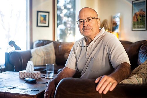 MIKAELA MACKENZIE / WINNIPEG FREE PRESS

David Gaboury, who has had major prostate cancer surgery cancelled at the last minute (and later rescheduled), poses for a photo in his home in Winnipeg on Tuesday, Dec. 20, 2022.  For Katie May story.
Winnipeg Free Press 2022.