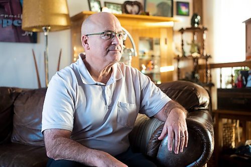 MIKAELA MACKENZIE / WINNIPEG FREE PRESS

David Gaboury, who has had major prostate cancer surgery cancelled at the last minute (and later rescheduled), poses for a photo in his home in Winnipeg on Tuesday, Dec. 20, 2022.  For Katie May story.
Winnipeg Free Press 2022.