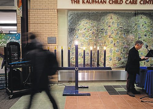 JESSICA LEE / WINNIPEG FREE PRESS

A pedestrian walks by a menorah at the Asper Jewish Community Centre on the fourth night of Hanukkah on December 21, 2022.

Stand up