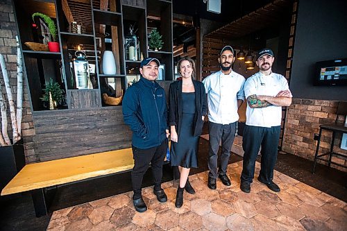 MIKAELA MACKENZIE / WINNIPEG FREE PRESS

Noel Soriano (chef, left), Emma Young (general manager), Arpit Sharma (sous chef), and Jordan Pennycook (sous chef) pose for a photo at Sage Creek&#x573; Block &amp; Blade Restaurant and Bar in Winnipeg on Wednesday, Dec. 21, 2022.  Restaurants are seeing a rise in holiday parties, since returning to a &#x4ae;ormal&#x4e0;season, as restrictions created a lot of barriers. For Shauna story.
Winnipeg Free Press 2022.