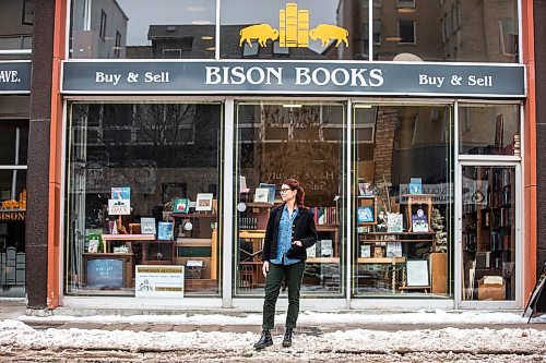 MIKAELA MACKENZIE / WINNIPEG FREE PRESS

Aimee Peake, owner of Bison Books, poses for a portrait in front of her shop in Winnipeg on Monday, Dec. 12, 2022. She&#x2019;s signed a lease for another three years at the Graham Avenue location. For Gabby story.
Winnipeg Free Press 2022.