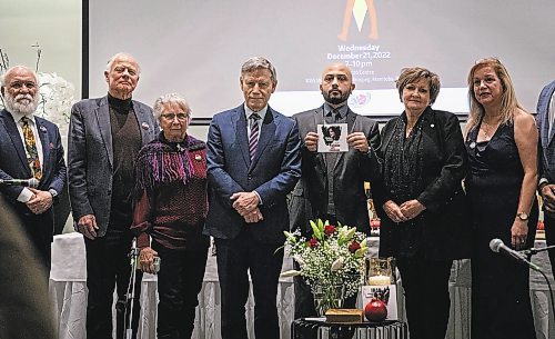 JESSICA LEE / WINNIPEG FREE PRESS

Arian Arianpour (holding photo), president of the Iranian Community of Manitoba, is photographed at the Winnipeg Iranian community&#x2019;s Yalda gathering at Centro Caboto on December 21, 2022 with local politicians.

Reporter: Melissa Martin