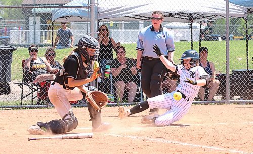 Westman U15 Magic base runner Kendall Charles scores the first run of the game as Eastman Selects catcher Pascale Kihn waits for the ball to arrive during the final at the International Classic at the Ashley Neufeld Softball Complex. (Perry Bergson/The Brandon Sun)