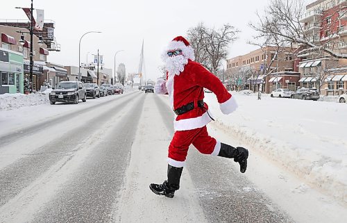 RUTH BONNEVILLE / WINNIPEG FREE PRESS 

Standup  - Santa makes coffee run

Santa Claus, also known as Joe Cook, makes a coffee run in-between visiting his nieces and nephews as Santa on Thursday afternoon.  He was spotted at his favourite coffee shop, Colosimo Coffee Roasters on Provencher Boulevard, when a photographer followed him as he ran back to his vehicle with 2 coffees and croissant in hand. 


Dec 22nd,  2022