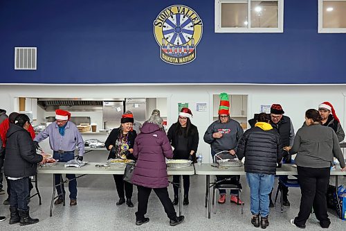 22122022
Members of Sioux Valley Dakota Nation&#x2019;s Chief &amp; Council as well as community directors serve dinner to community members during the Christmas Dinner at the SVDN Veterans Hall on Thursday evening. Sioux Valley also held dinners in Winnipeg and Brandon for members of the First Nation in those cities earlier this month and will hold a final dinner today for community elders. (Tim Smith/The Brandon Sun)