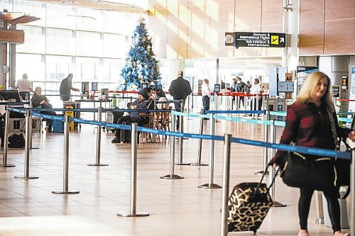 MIKAELA MACKENZIE / WINNIPEG FREE PRESS

Winnipeg Richardson International Airport, where many flights are being cancelled or delayed this holiday season due to storms in Ontario and BC, in Winnipeg on Friday, Dec. 23, 2022. For Katie story.
Winnipeg Free Press 2022.