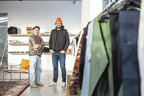 MIKAELA MACKENZIE / WINNIPEG FREE PRESS

Daniel Basanes (left) and Chris Watchorn, co-creators of Hobby&#x2022;ism (a new menswear store opening this Boxing Day), pose for a photo in the shop on Colony Street in Winnipeg on Friday, Dec. 23, 2022. For Gabby story.
Winnipeg Free Press 2022.