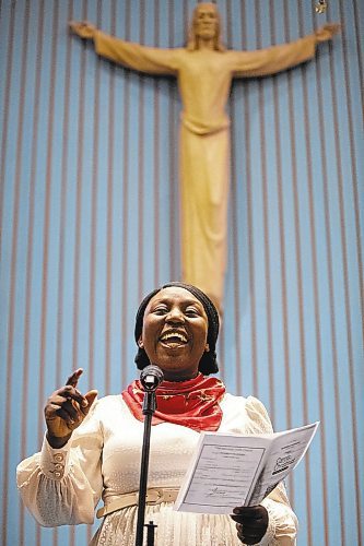 Daniel Crump / Winnipeg Free Press. Pelumi Ruth Enejoh sings Christmas songs during Carols of Christmas: The Greatest Story Ever Told at the Apostolic Faith Church in Winnipeg. December 18, 2022.