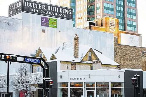 MIKAELA MACKENZIE / WINNIPEG FREE PRESS

A peaked roof pokes out above storefronts, a vestige of another time, at Kennedy Street and Graham Avenue in Winnipeg on Friday, Dec. 23, 2022. For Melissa story.
Winnipeg Free Press 2022.