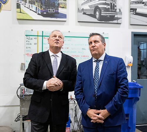 JESSICA LEE / WINNIPEG FREE PRESS

CEO and president of New Flyer Industries, Paul Soubry (left) and Deputy Premier Cliff Cullen are photographed after a press announcement of a loan to NFI, at NFI&#x2019;s bus warehouse on December 23, 2022.

Reporter: Danielle Da Silva