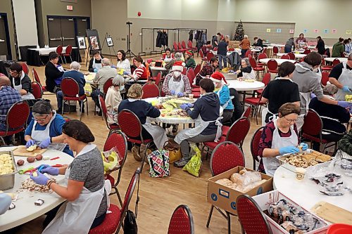 23122022
Volunteers were busy Friday preparing ingredients, wrapping presents and getting everything else ready for the Westman and Area Traditional Christmas Dinner at the Keystone Centre. The dinner runs from noon to 6:00 PM on Christmas day. (Tim Smith/The Brandon Sun)