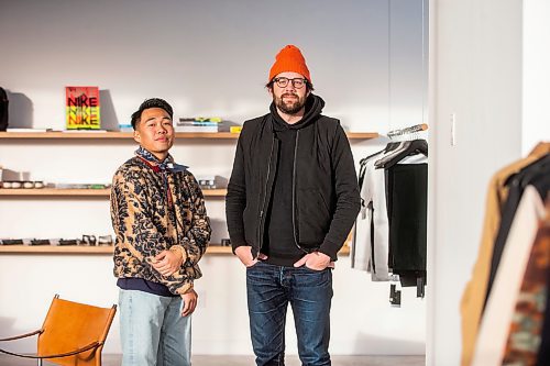 MIKAELA MACKENZIE / WINNIPEG FREE PRESS

Daniel Basanes (left) and Chris Watchorn, co-creators of Hobby&#x2022;ism (a new menswear store opening this Boxing Day), pose for a photo in the shop on Colony Street in Winnipeg on Friday, Dec. 23, 2022. For Gabby story.
Winnipeg Free Press 2022.