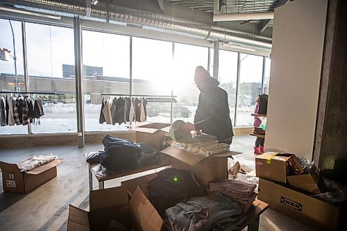 MIKAELA MACKENZIE / WINNIPEG FREE PRESS

Chris Watchorn, co-creator of Hobbyism (a new menswear store opening this Boxing Day), preps goods in the shop on Colony Street in Winnipeg on Friday, Dec. 23, 2022. For Gabby story.
Winnipeg Free Press 2022.