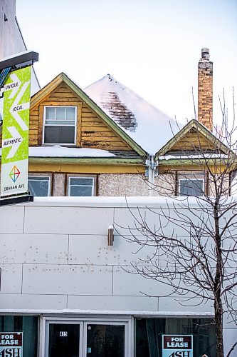 MIKAELA MACKENZIE / WINNIPEG FREE PRESS

A peaked roof pokes out above storefronts, a vestige of another time, at Kennedy Street and Graham Avenue in Winnipeg on Friday, Dec. 23, 2022. For Melissa story.
Winnipeg Free Press 2022.