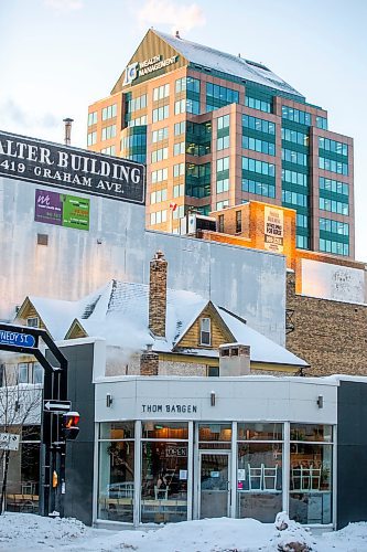 MIKAELA MACKENZIE / WINNIPEG FREE PRESS

A peaked roof pokes out above storefronts, a vestige of another time, at Kennedy Street and Graham Avenue in Winnipeg on Friday, Dec. 23, 2022. For Melissa story.
Winnipeg Free Press 2022.