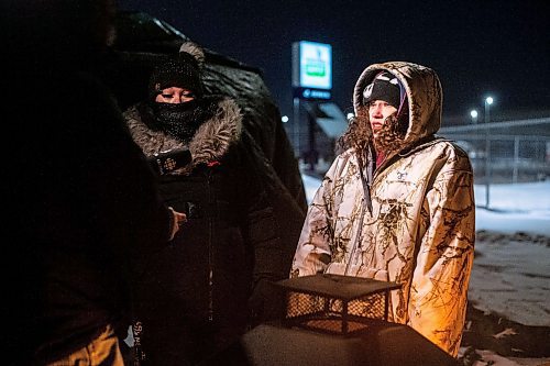 MIKAELA MACKENZIE / WINNIPEG FREE PRESS

Melissa Normand (left) and Cambria Harris speak to the media before going up to the landfill for a ceremony at the Brady landfill in Winnipeg on Friday, Dec. 23, 2022. For Erik story.
Winnipeg Free Press 2022.