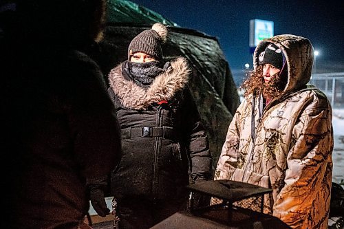 MIKAELA MACKENZIE / WINNIPEG FREE PRESS

Melissa Normand (left) and Cambria Harris speak to the media before going up to the landfill for a ceremony at the Brady landfill in Winnipeg on Friday, Dec. 23, 2022. For Erik story.
Winnipeg Free Press 2022.