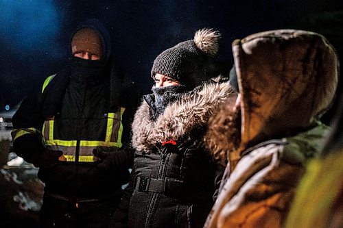 MIKAELA MACKENZIE / WINNIPEG FREE PRESS

Melissa Normand (centre) and Cambria Harris (right) speak to the media before going up to the landfill for a ceremony at the Brady landfill in Winnipeg on Friday, Dec. 23, 2022. For Erik story.
Winnipeg Free Press 2022.