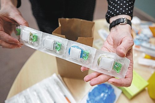 MIKE DEAL / WINNIPEG FREE PRESS
Kim Bailey, Director, Prevention Testing and Wellness at Nine Circles Community Health Centre, holds some stericups that can be given to clients during a tour of the Pit Stop at 705 Broadway.
See Katrina Clarke story
221215 - Thursday, December 15, 2022.