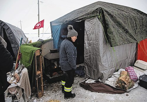 JESSICA LEE / WINNIPEG FREE PRESS

Protestor Melissa Normand is photographed at the encampment at Brady Landfill on December 27, 2022.

Reporter: Chris Kitching