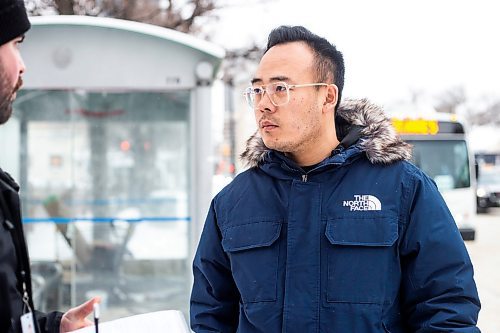 MIKAELA MACKENZIE / WINNIPEG FREE PRESS

Frank Zhang talks to a reporter at a downtown Winnipeg Transit stop on Main Street at Broadway on Tuesday, Dec. 27, 2022. For Tyler story.
Winnipeg Free Press 2022.