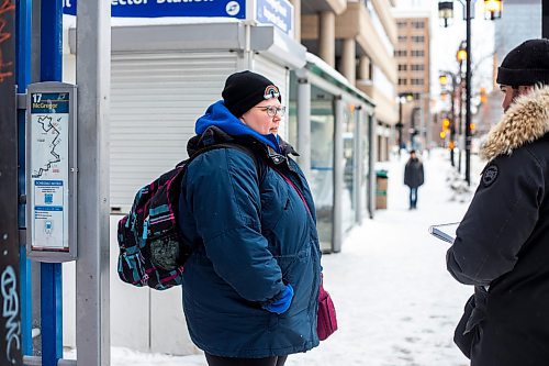 MIKAELA MACKENZIE / WINNIPEG FREE PRESS

Jennifer Caryk talks to a reporter at a downtown Winnipeg Transit stop on Graham Avenue on Tuesday, Dec. 27, 2022. For Tyler story.
Winnipeg Free Press 2022.