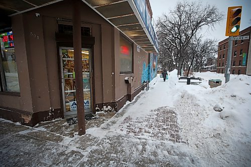 JOHN WOODS / WINNIPEG FREE PRESS
A person leaves a store on Ellice and Spence near the University of Winnipeg in Winnipeg Tuesday, December 27, 2022. University of Winnipeg Student  Association is concerned about student connection and safety downtown. 

Re: Mackintosh